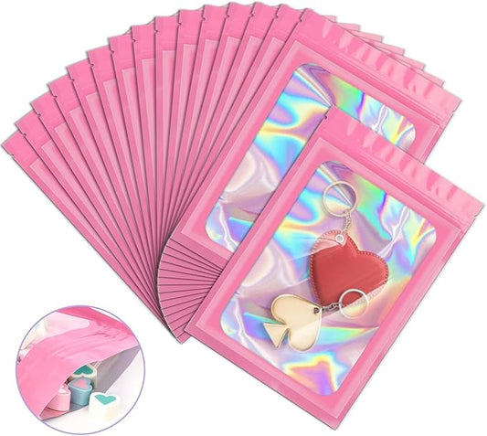 ANZNKU 100 Pcs Smell Proof Mylar Resealable Bags, Holographic Packaging Bags, Resealable Odor Foil Pouch Zip Bag with Clear Window for Food Storage and Lipgloss, Jewelry Lash (Pink, 3.9 x 7.1 Inch)