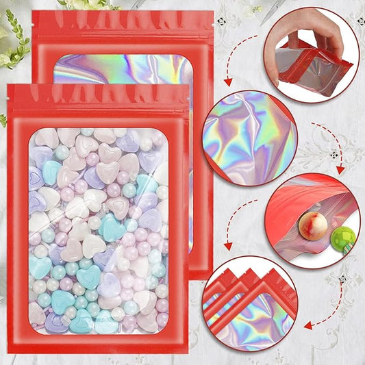 ANZNKU 100 Pcs Smell Proof Mylar Resealable Bags, Holographic Packaging Bags, Resealable Odor Foil Pouch Zip Bags with Clear Window for Food Storage and Lipgloss, Jewelry Lash (Red, 3.9 x 7.1 Inch)